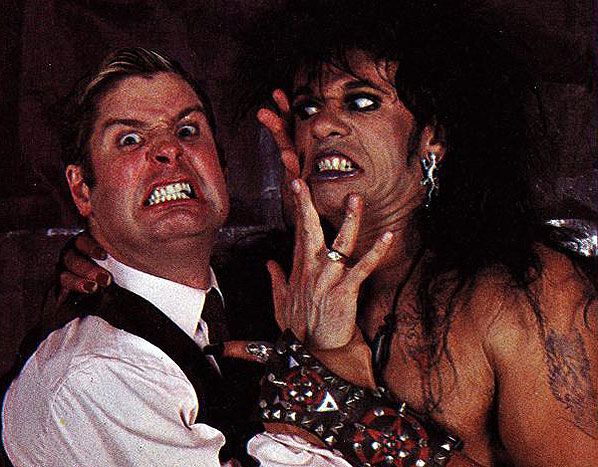 Rev. Aaron Gilstrom (Ozzy Osbourne) and Sammi Curr (Tony Fields)