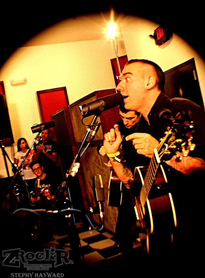 Anti-Flag performing an intimate acoustic set at 11th Street Records in Las Vegas.