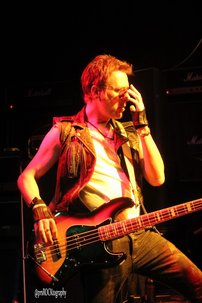 Former Mickey Ratt/Rough Cutt bassist Matt Thorne, rocking on stage with Pearcy!