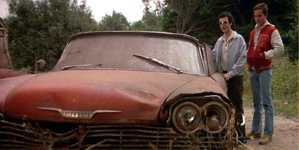 In the film, Arnie Cunningham (left, portrayed by Keith Gordon) becomes obsessed with the titular car, and is radically changed by his obsession.