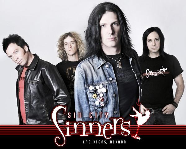 The "classic" version of the band that appeared on the first three CDs. From left to right - Doc Ellis, Rob Cournoyer, Todd Kerns, Brent Muscat