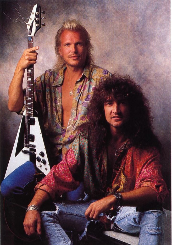 Vintage image of Robin McAuley and Michael Schenker.